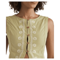 Cropped detail view of a woman wearing the Your Crush Shirt - Womens from Billabong in Light Olive. Featuring line and floral embroidered detail in contrast white, small round wood look button closure, round neckline and sleeveless cut.
