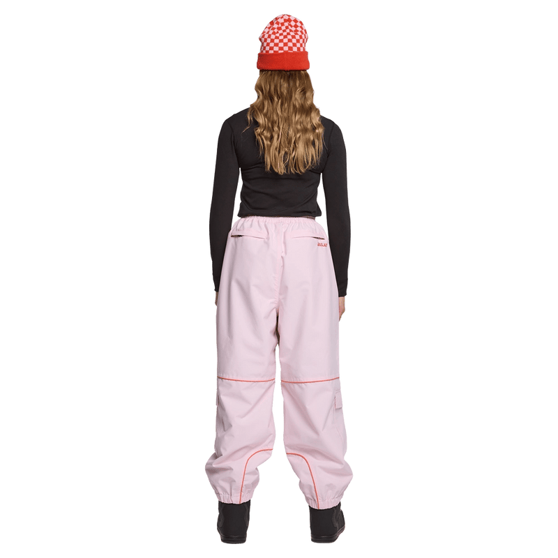 Back view of woman wearing the Rojo Nine Oh Ski Pants - Womens in Pink-a-boo.