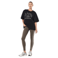 Full view of the PE NATION Altitude Tee Washed Black Tee, 26/27 Womens's model