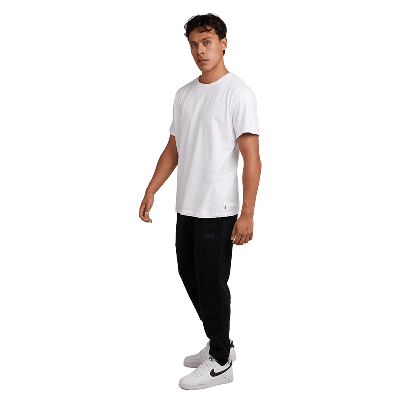 Full-body view of the St. Goliath Tech Track Pants in Black colourway, men's model