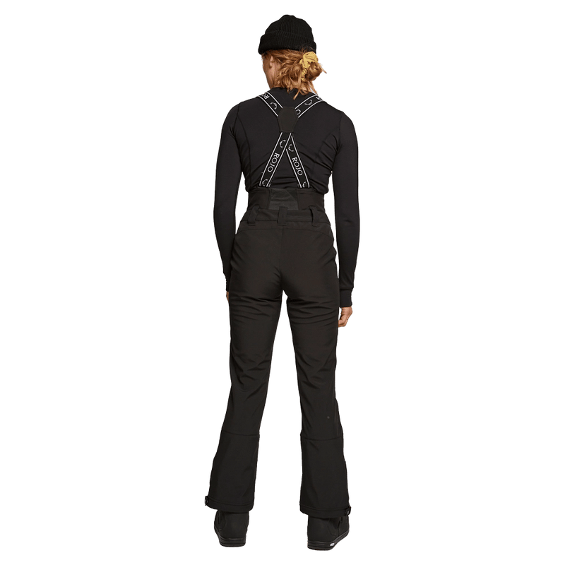 Back view of women wearing theRojo Softshell High Rise Ski Pants - Womens in colour True Black