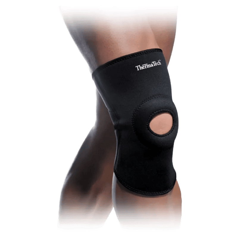 Therma Tech black open knee compression sleeve with patella cutout worn on a leg.
