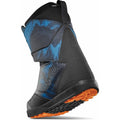 Thirtytwo Lashed Double BOA snowboard boot in black and blue tie-dye with a bright orange outsole, rear side view.