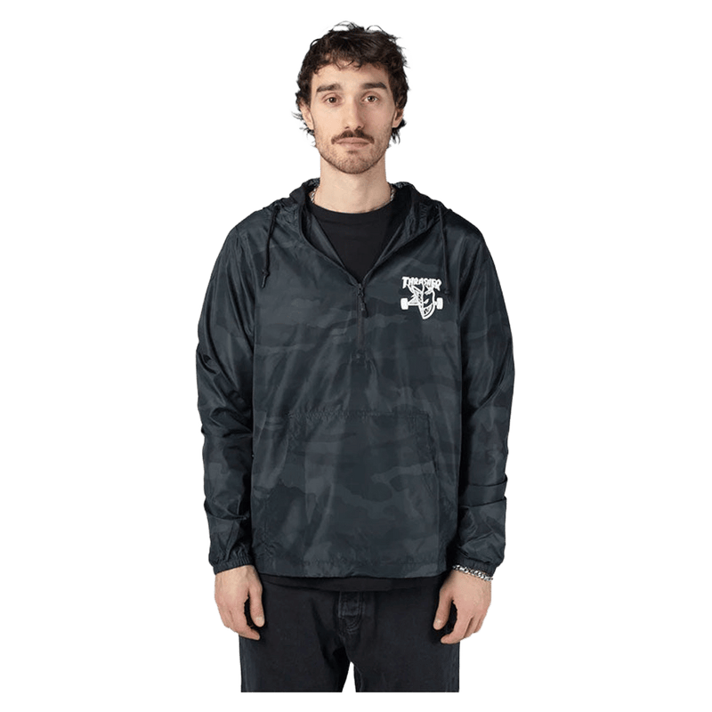 Thrasher THR X SF Thrash & Burn black camo anorak with white chest logo, half-zip, hood, and front pouch pocket.