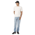Front view of man in the Rollas Tim Slims Bad Boy Boogie Jeans in colour Mid Blue