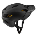 Matte black Troy Lee Designs Flowline Mips kids mountain bike helmet with air vents, visor, and yellow MIPS liner.