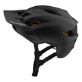 Matte black TLD Flowline Mips kids mountain bike helmet with visor and side vents, shown from a side profile.