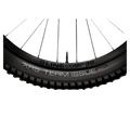 2023 Trek Fuel EX 8 Gen 6 mountain bike with a grey to black gradient frame, full suspension, and knobby tires.