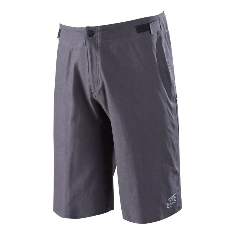 Charcoal Troy Lee Designs Drift MTB shorts with adjustable waist tabs, button fly, and small logo on the leg.