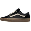 Black Vans Old Skool shoe with white sidestripe, off-white laces, and a brown gum rubber sole in a side profile view.