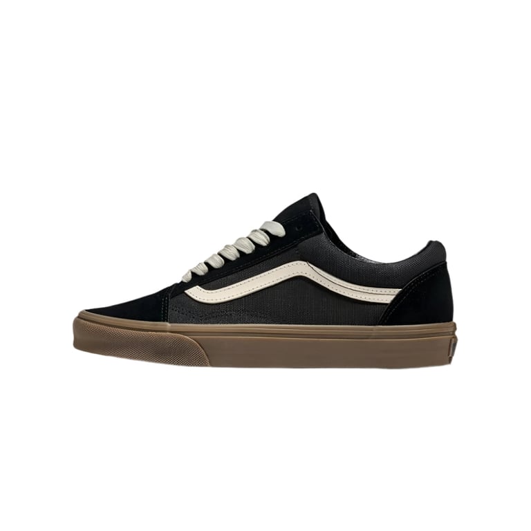 Black Vans Old Skool shoe with white side stripe, white laces, and gum brown rubber sole in a side profile view.