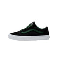 Black Vans Old Skool shoe with green side stripe, green laces, and white rubber sole in a side profile view.