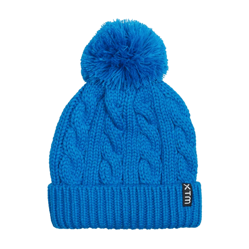 View of the Daydream Beanie for Kids in Malibu blue. Featureing a cable knit design, fold up cuff and pom pom.