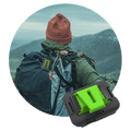 Zoleo Satellite Communicator Cradle Kit with black mount and green clip, shown attached to a hiker's backpack.