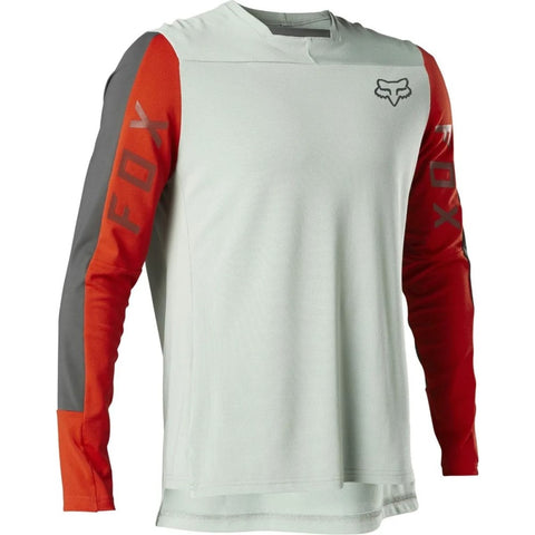 Long-sleeve mountain bike jersey in light green with red and grey sleeves.