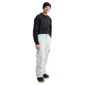 Man wearing  the Burton AK Cyclic Gore-Tex 2L Snowboard Pants in Grey-Cloud and a black fleece top