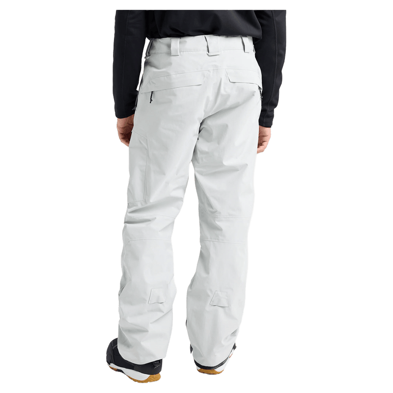 Rear view of a man wearing the Burton AK Cyclic Gore-Tex 2L Snowboard Pants in Grey Cloud