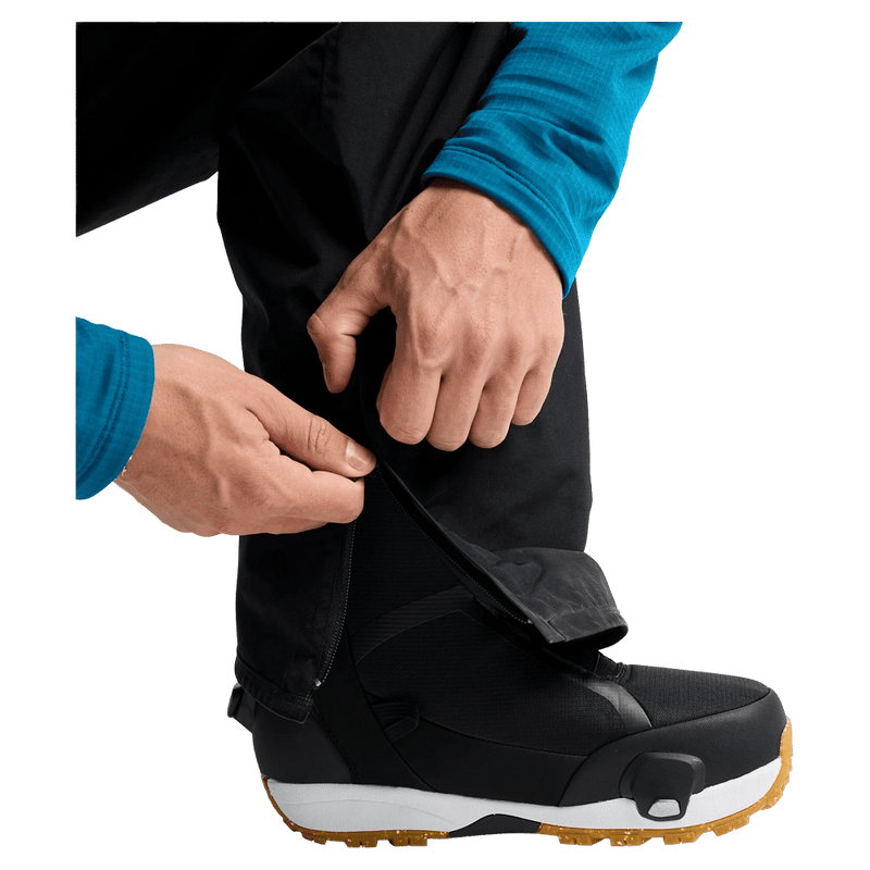Detail view of a man wearing the Burton AK Cyclic Gore-Tex 2L Snowboard Pants in Black