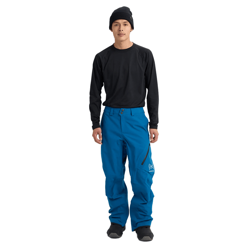 Man wearing Blue Burton AK Cyclic Gore-Tex 2L Snowboard Pants and a Black fleece top