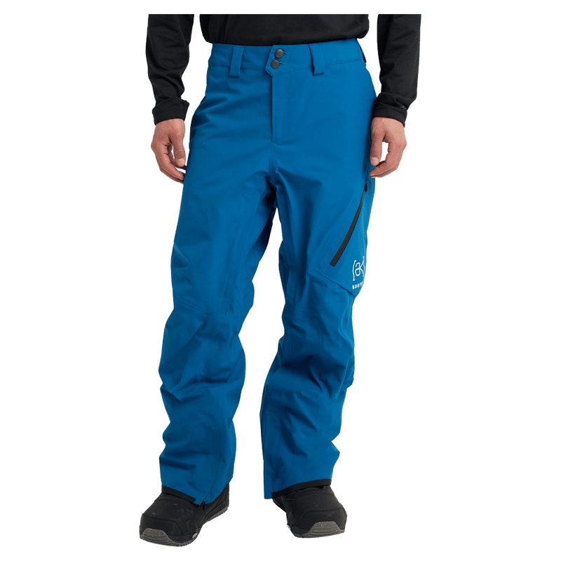 Front view of a man wearing the Burton AK Cyclic Gore-Tex 2L Snowboard Pants in Blue Teal