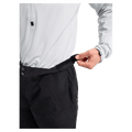 Detailed cropped view of a man wearing the  Burton AK Swash Gore-Tex 2L Snowboard Pants in black