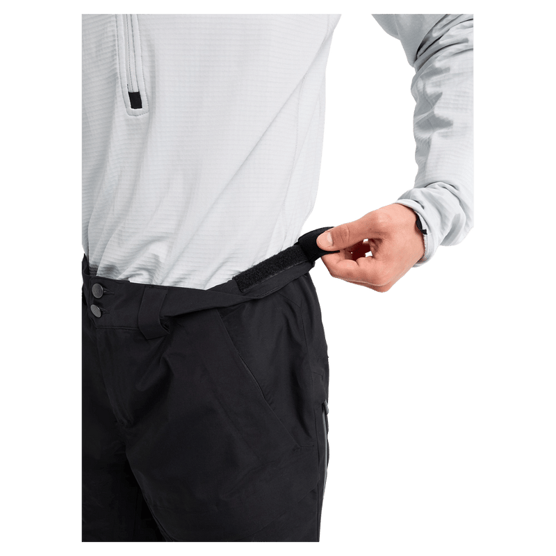Detailed cropped view of a man wearing the  Burton AK Swash Gore-Tex 2L Snowboard Pants in black