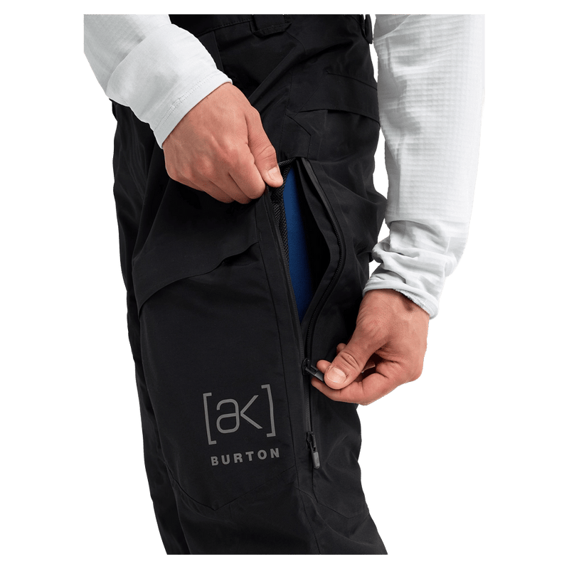 Detailed cropped view of a man wearing the  Burton AK Swash Gore-Tex 2L Snowboard Pants in black
