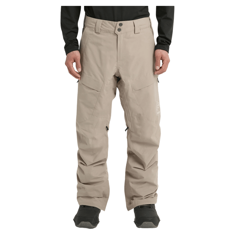 Front cropped view of a man wearing the  Burton AK Swash Gore-Tex 2L Snowboard Pants in summit taupe
