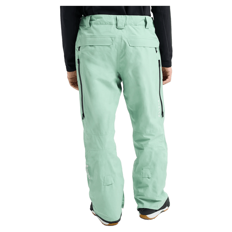 Rear cropped view of a man wearing the  Burton AK Swash Gore-Tex 2L Snowboard Pants in soft sage