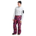 Front full body view of a man wearing the Burton AK Swash Gore-Tex 2L Snowboard Pants in Slash Multi with a white fleece top and black beanie