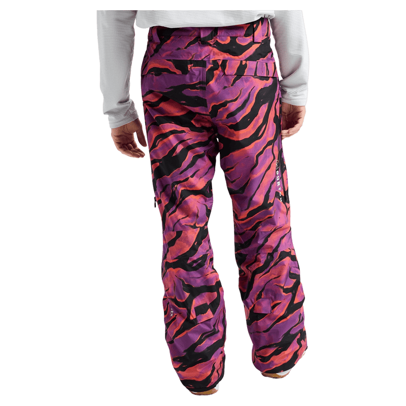 Rear cropped view of a man wearing the  Burton AK Swash Gore-Tex 2L Snowboard Pants in slash multi