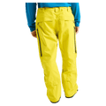 Rear cropped view of a man wearing the  Burton AK Swash Gore-Tex 2L Snowboard Pants in yellow