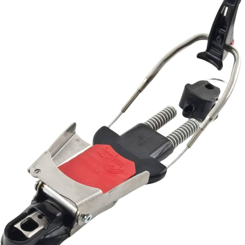 A single 22 Designs Axl Telemark Binding with red base plate, dual springs, and stainless steel frame, angled view.