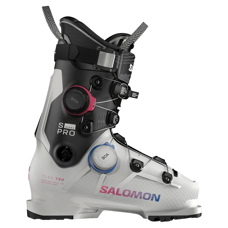 Salomon S/Pro Supra Dual Boa 130 ski boot in white and black with red and blue BOA dials and side profile view.