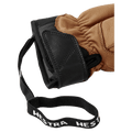 Close-up of tan and black Hestra Leather Fall Line glove cuff with velcro closure and branded elastic wrist leash in colour Cork.