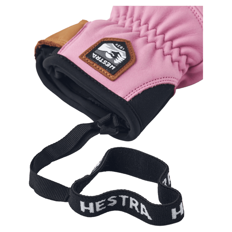 Leather Hestra Fall Line glove cuff with logo patch, elastic wrist, and black branded wrist strap in colour Cerise