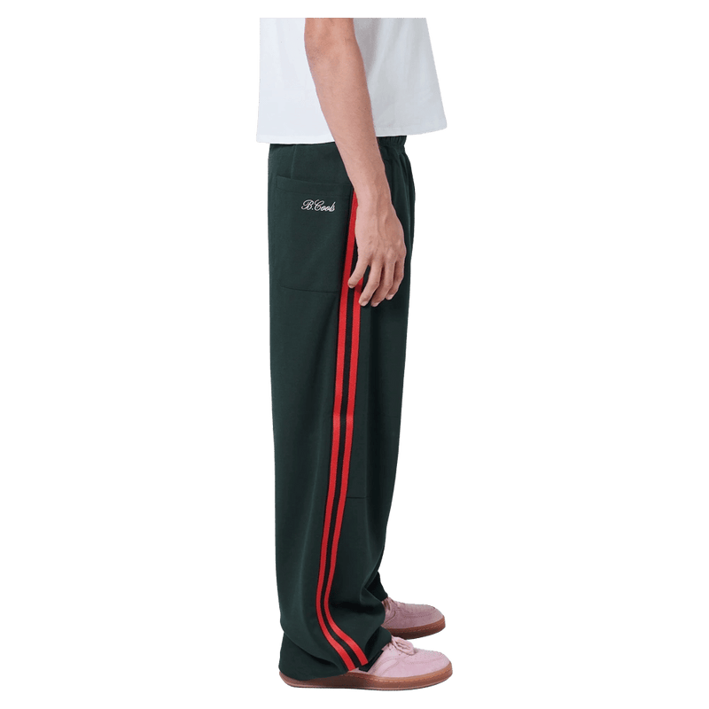 Side view of Barney Cools Boxy Track Pant in colour Forest
