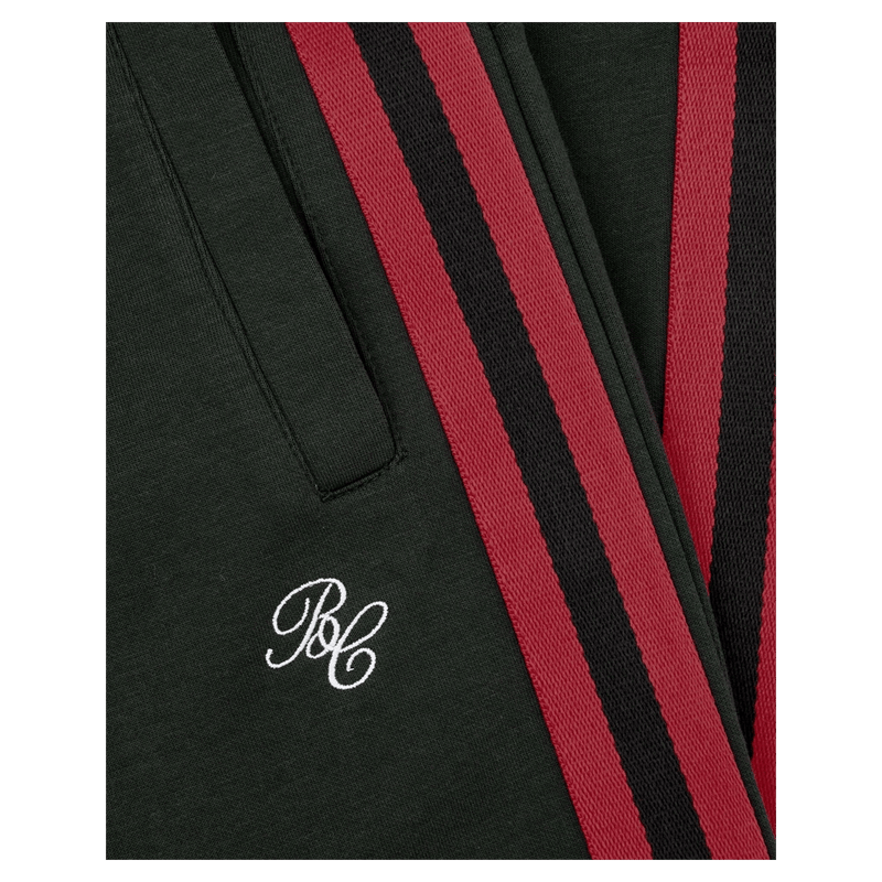 Close view of Barney Cools Boxy Track Pant in colour Forest