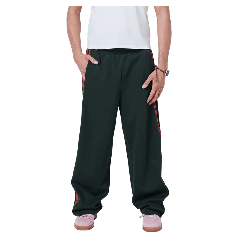 Front view of Barney Cools Boxy Track Pant in colour Forest.