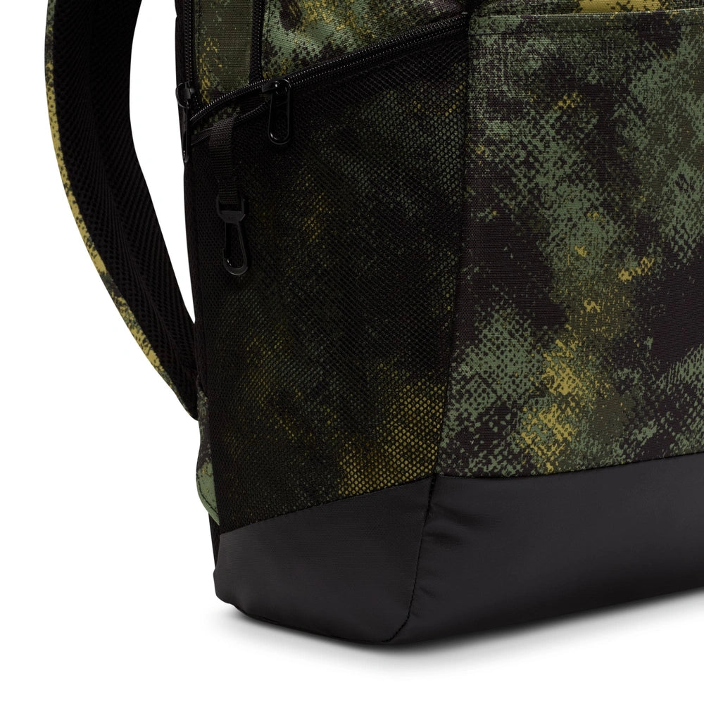 Lower side pocket image of the Brasilia Backpack in Oil Green Multi