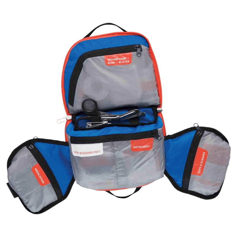 Open view of the Adventure Medical Kits Explorer First Aid Kit in Blue with black strap. Showing 4 zipper oraganised pouches labeling sections to find items quickly.