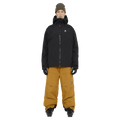 Full-body view of the Armada Atalantis 2L Pants in Golden Brown colourway, unisex's model