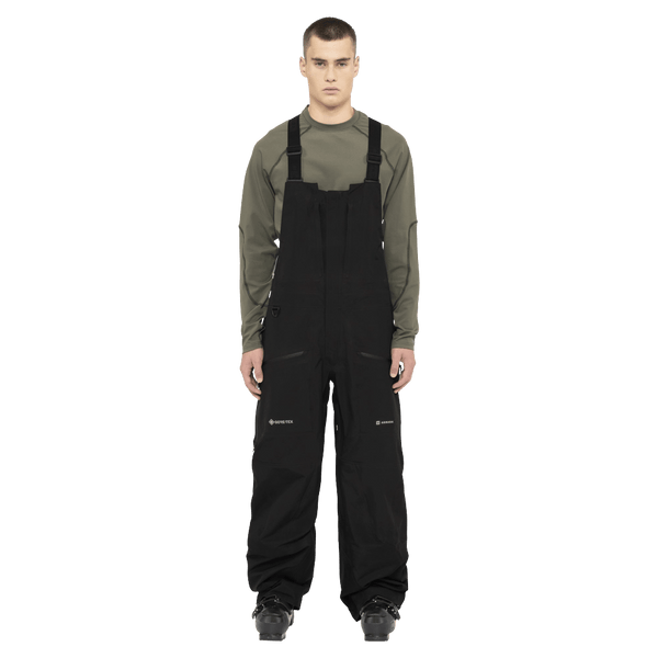 Front view of the Armada Coveted 3L Bib in Black colourway, men's model