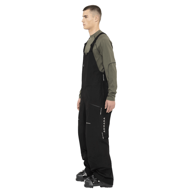 Side view of the Armada Coveted 3L Bib in Black colourway, men's model