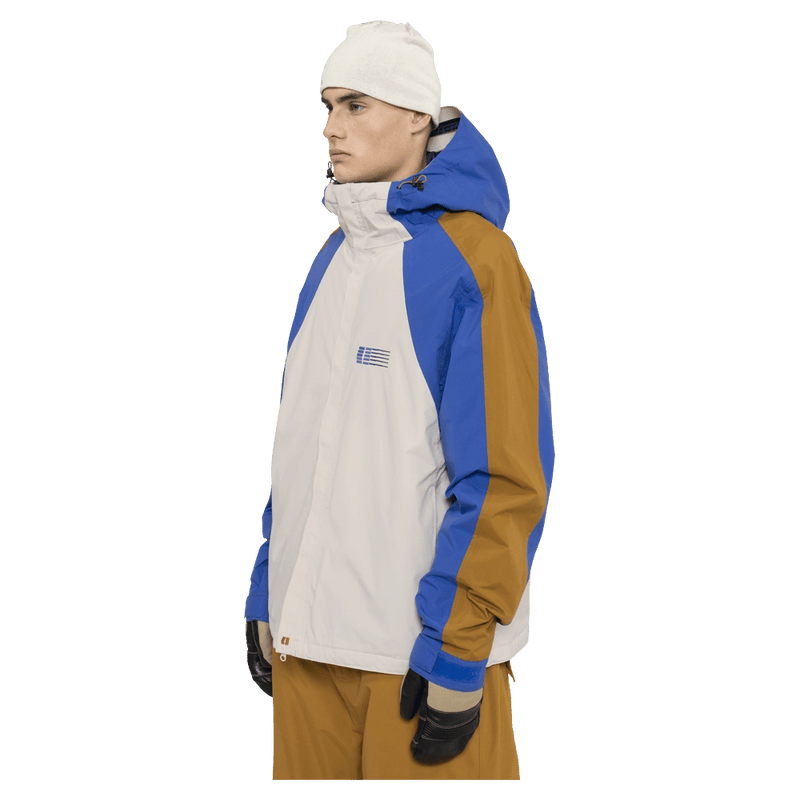 Side view of the Armada Gansett 2L Insulated Jacket in cream, dazzler and golden brown colourway, unisex's model