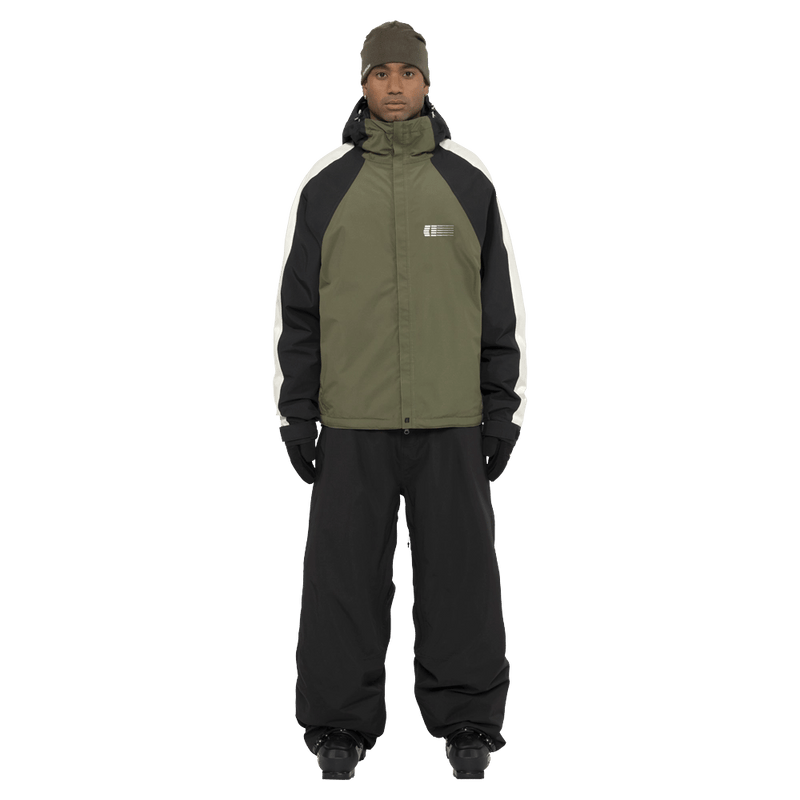 Full-body view of the Armada Gansett 2L Insulated Jacket in olive, black and cream colourway, unisex's model