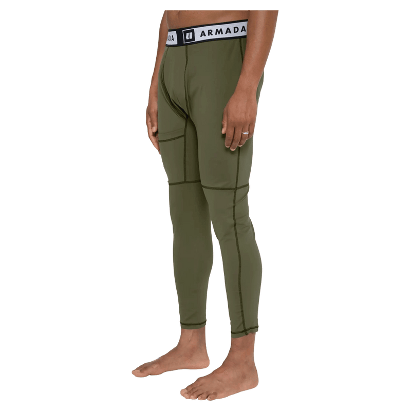 Side view of the Armada Hoopler Baselayer Bottom in Olive colourway, unisex's model