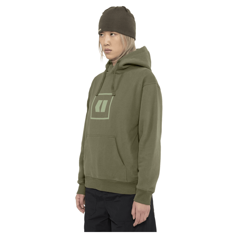 Side view of the Armada Icon Hoodie in Olive colourway, unisex's model