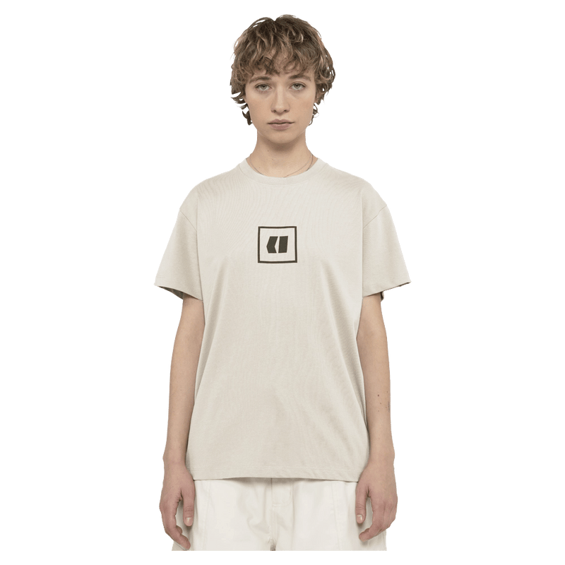 Front view of the Armada Icon Tee in Cream colourway, unisex's model
