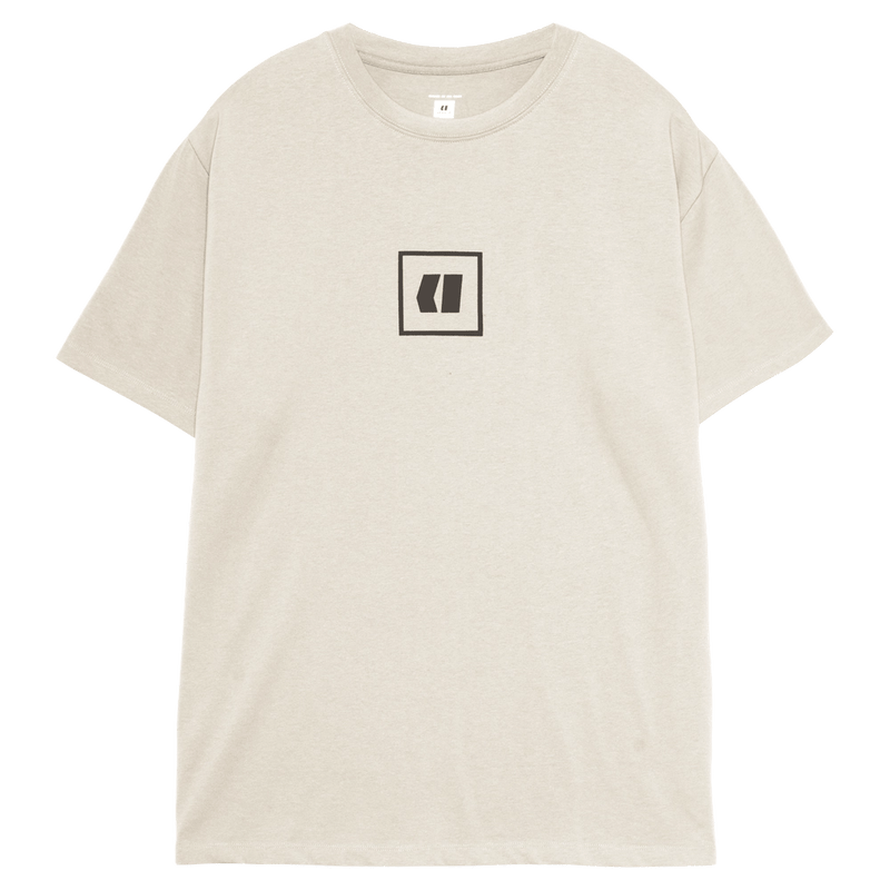 Main view of the Armada Icon Tee in Cream colourway, unisex's model